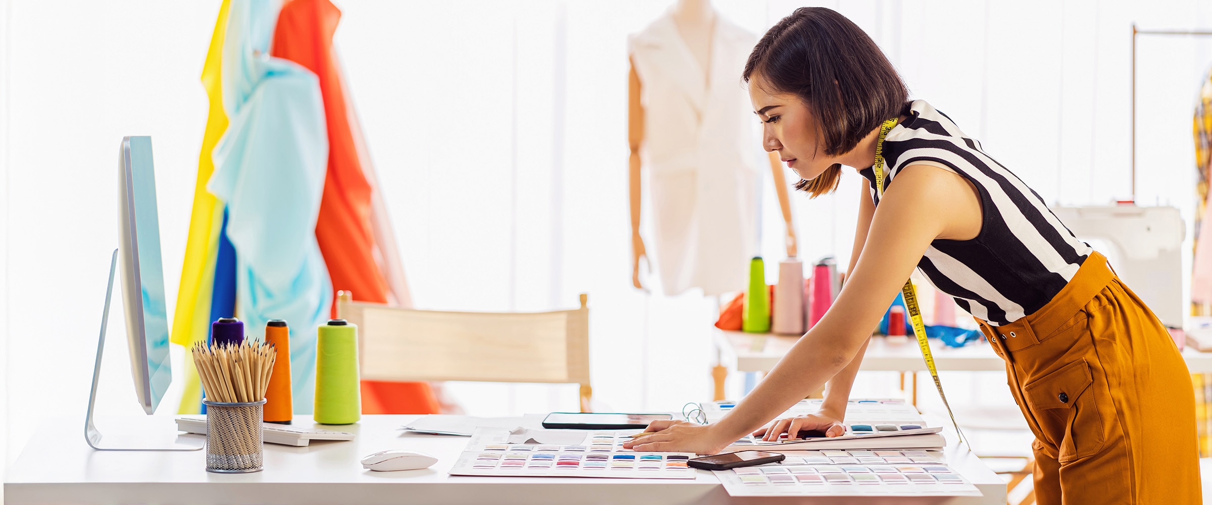 Photo of business woman working at her desk.