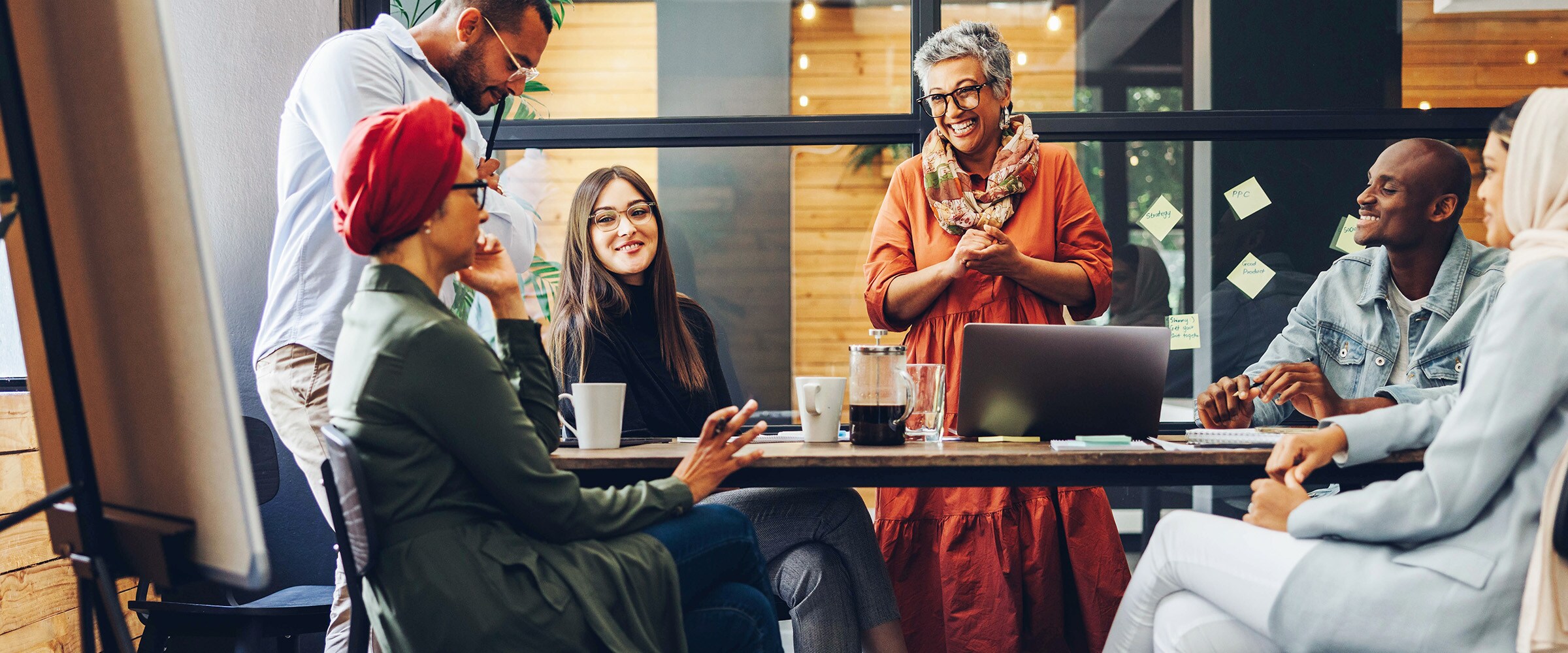 Photo of a diverse team at a business conference table.