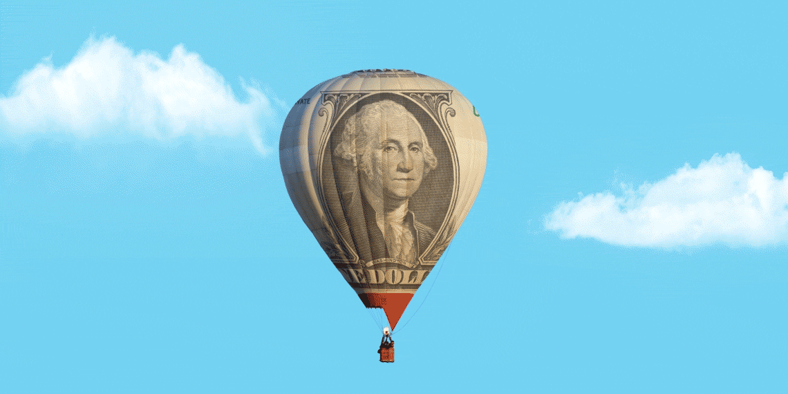 A hot air balloon with a dollar bill on it